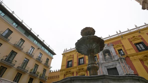 Low angle of a fountain and the Obispado