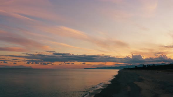 Red sunset On the Coast with Calm Ocean