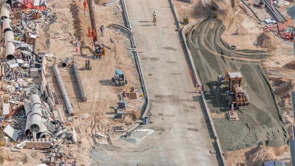 Excavator Truck and Grader Working at Road Construction Site in Dubai Downtown Timelapse