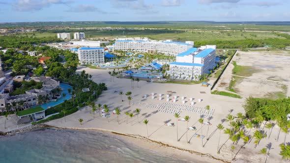 Tui Blue Sensatori seafront resort complex at Cap Cana in Dominican Republic. Aerial forward