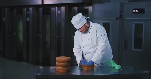 A Young Pudgy Enticing Looking Chef Cuts Open a