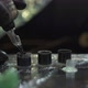 Professional Tattooist Fills Magnum Needle with Black Ink - VideoHive Item for Sale