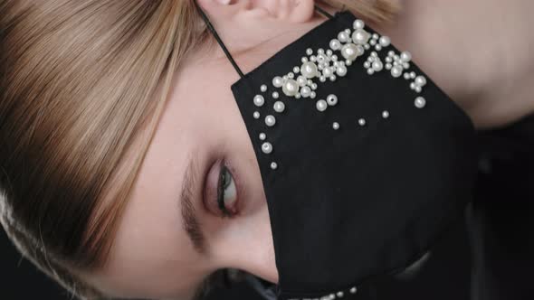 Vertical Shot of Woman in Stylish Face Mask