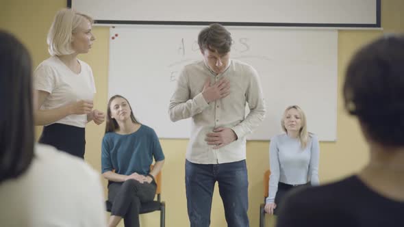 Adult Caucasian Man Expressing Different Emotions Studying Acting