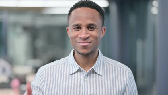 African Businessman Showing Thumbs Up Sign