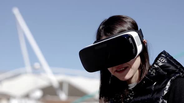 Content Woman in VR Headset on Street