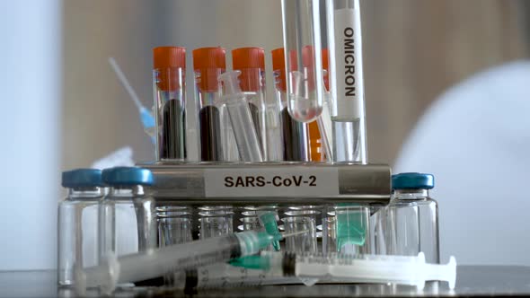 Laboratory SARS COV 2 Test Tubes Labelled Alpha Gamma Delta Beta And Omicron Variants Being Placed I