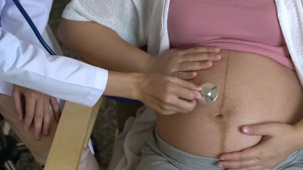 Pregnant Woman and Gynecologist Doctor at Hospital