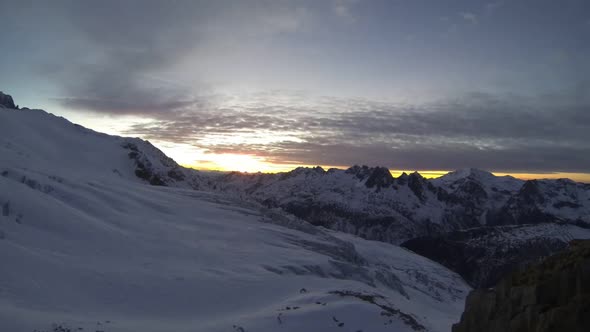 Timelapse of snow covered mountains.