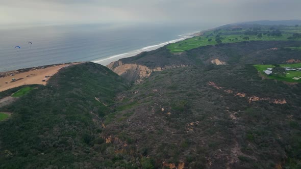 drone flight over coastal landscape at Torrey Pines State Natural Reserve, San Diego, CA.