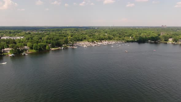 Aerial view of a harbour in a lake, 4k drone