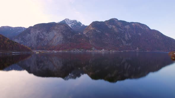 Flying Over the Lake Towards the Town of Hallstatt in Austria