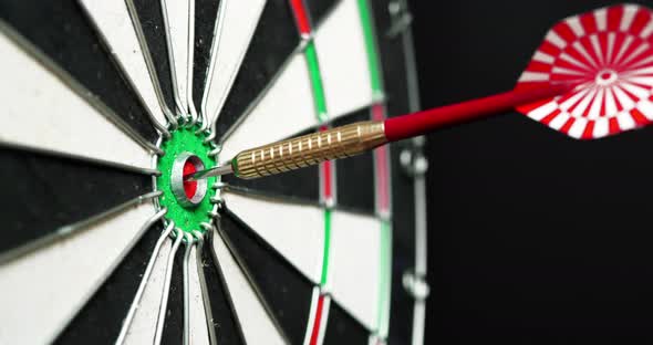 4K - Dart hits the bullseye. Side view