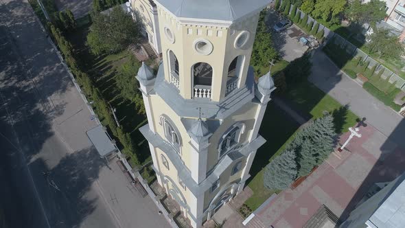 Aerial view of a tower next to a church