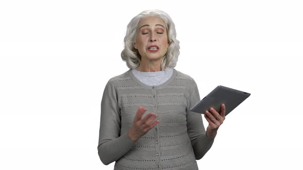 Mature Woman with Pc Tablet on White Background