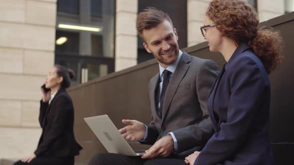 Businessman and Businesswoman Working Together