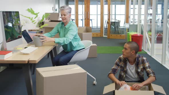 Woman and man working in a creative office