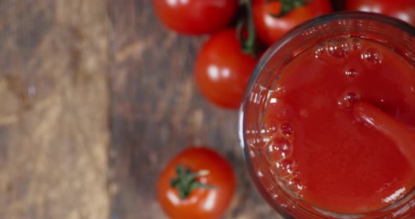 Juice of Ripe Tomatoes Poured Into a Glass. 