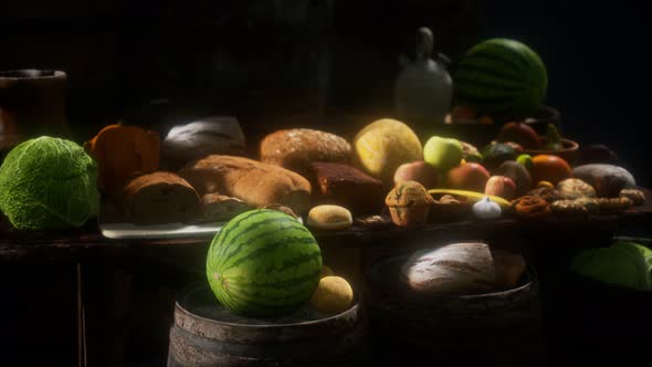 Food Table with Wine Barrels and Some Fruits, Vegetables and Bread alt