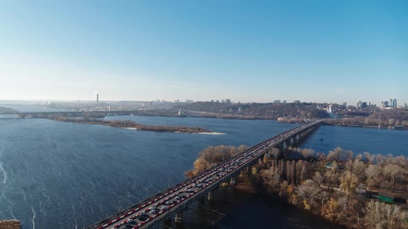 Traffic of Trucks Cars Buses on the Bridge Aerial View