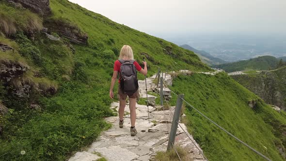 Tourist Woman Trekking on Monte Generoso