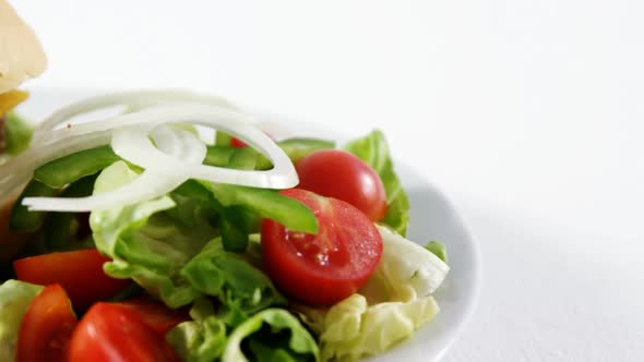 Snacks and salad on plate