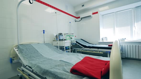 Hospital Room with a Medical Ventilator and Nobody Inside