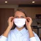 Portrait of blonde woman wearing a face mask waiting for the corona virus - VideoHive Item for Sale