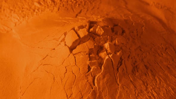 Crumbling Orange Powder Material Closeup Shot