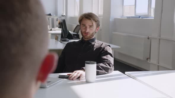 Close Up View of a Man Who Talks to the Customer