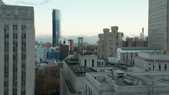 Forwards Fly Above Civic Center Buildings