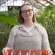 Young Farmer Puts a Basket of Seedlings on the Table - VideoHive Item for Sale