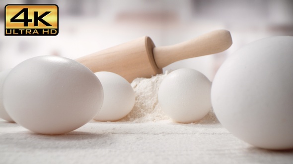 Baking Ingredients and Tools Laying on Pastry Board