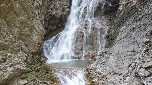 Margaret Falls cascading down a rocky mountain in the beautiful, lush Herald Provincial Park located