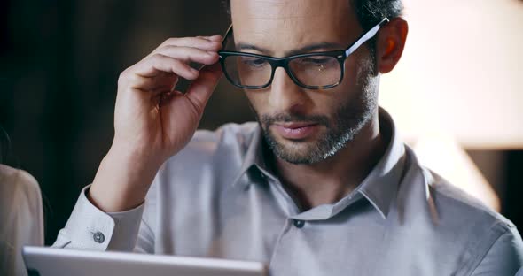 Man Using Tablet Technology