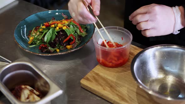 Chef Serves Exotic Salad on a Plate
