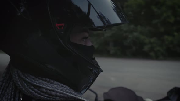 Close Up of Sexy Woman in a Black Helmet