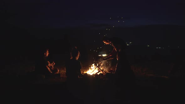 People around a campfire