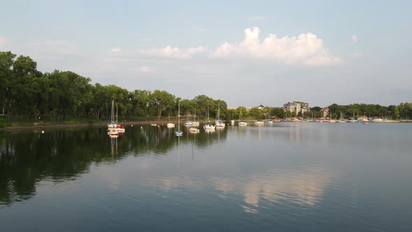 Boats at lake Bde Maka Ska in Minneapolis during summer time, Minnesota, United States