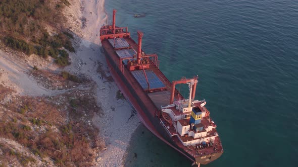 The Ship Ran Aground. Environmental Pollution at Sea. Aerial View. Grounded Ship. Drone Footage