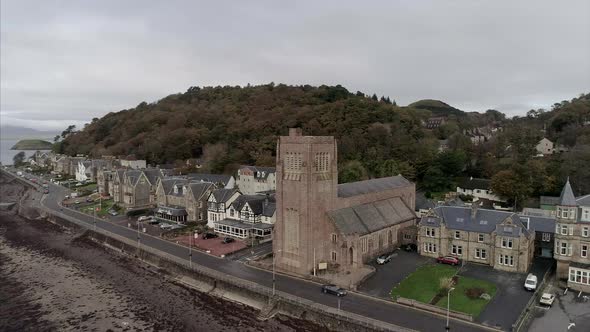 Aerial Pan Around of Oban Scotland on a Cloudy Day