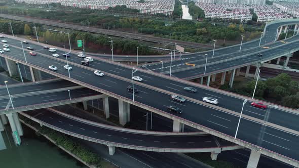 Aerial Panning View of Road Junction with Moving Cars