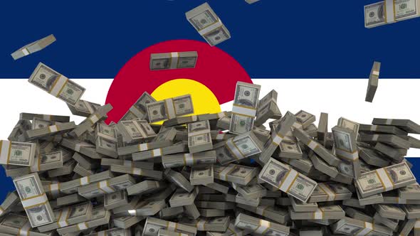 US Dollars falling in front of Colorado State Flag
