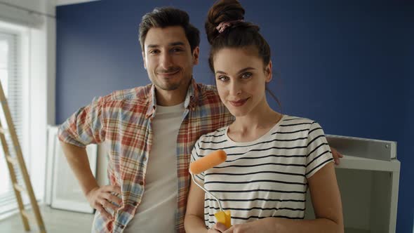 Video portrait of young couple ready to paint a room. Shot with RED helium camera in 8K
