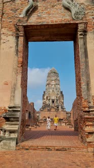 Ayutthaya Thailand at Wat Ratchaburana Couple Men and Women with a Hat Visiting Ayyuthaya Thailand