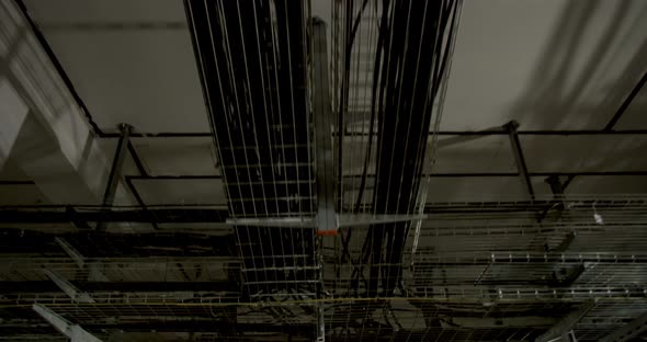 Routing of the Cables at the Factory on the Ceiling in Metal Cages