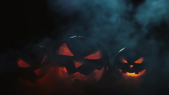 Jack-o-lanterns with burning fire inside