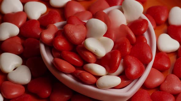 Rotating stock footage shot of Valentines decorations and candies - VALENTINES 0074