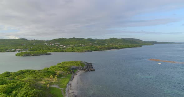 Aerial of quiet sea overlooking green landscape, Cap Chevalier, Sainte-Anne