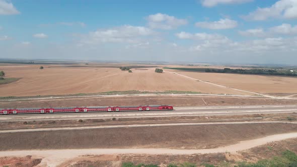 train crosses wheat field at southern district at israel